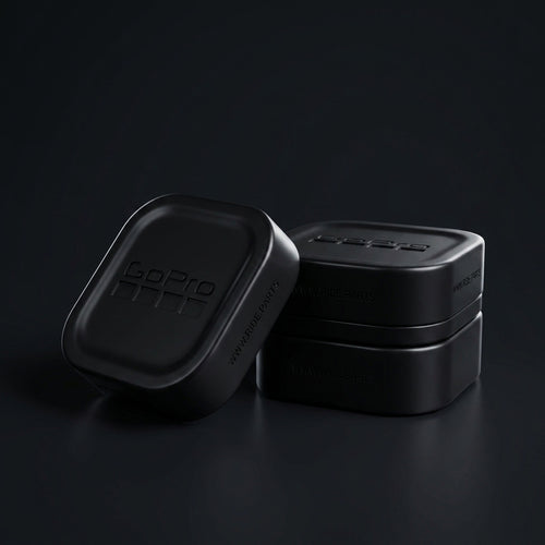 GoPro 13 Lens Covers in black, a cover and lens box set on a dark surface.