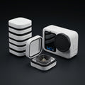 GoPro 13 lens covers and lens boxes, a stack of white boxes, one open box with a lens, and a GoPro 13 with a black lens cover