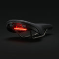 Flush Tail Light for Specialized saddles, red LED strip sitting flush in the saddle recess, seen from the rear
