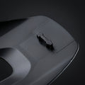 Breakaway Visor Pin mounted on the underside of a black helmet visor, close up