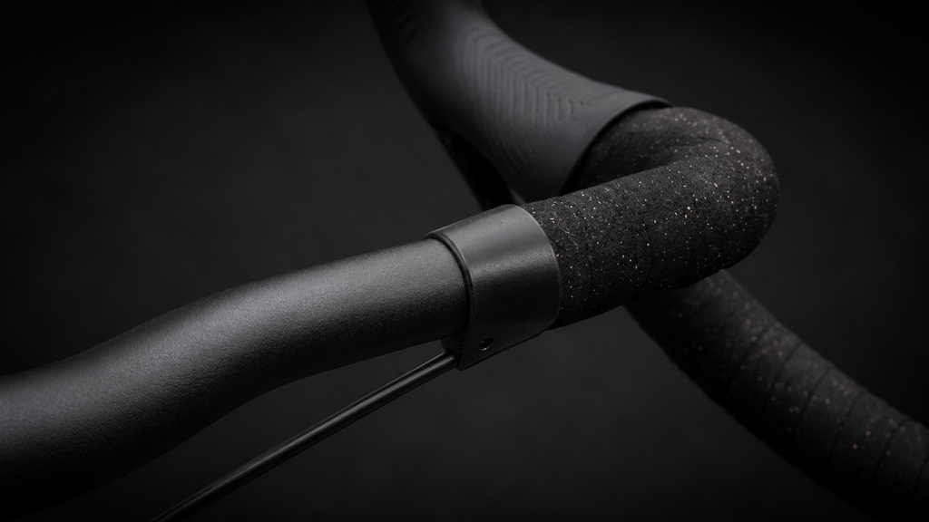 Close-up of the Wrap Clamp in black matte where the bar tape ends