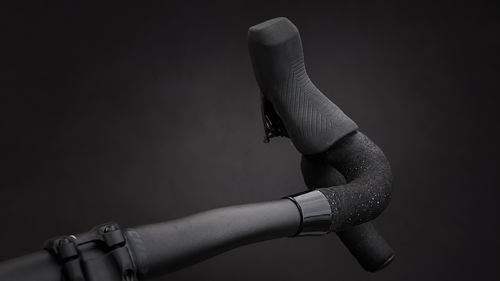 Wrap Clamp in black polished under the brake hood on a road bike drop bar